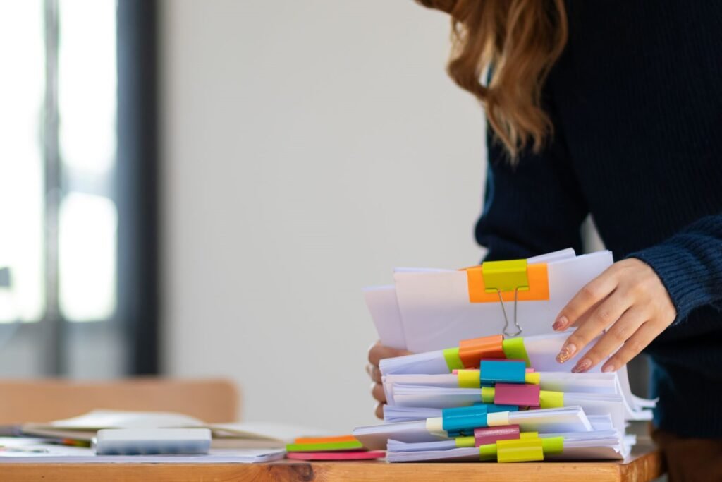 Documents required to sell property in France including title deed, diagnostics, tax records, and notaire paperwork